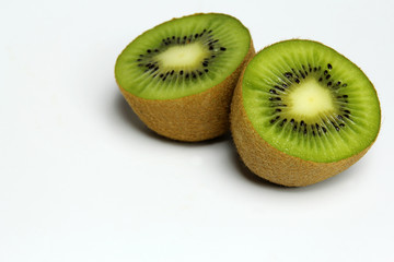 Fototapeta premium Two part of kiwi fruit isolated on white background