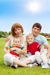 Fototapeta premium Happy family with two children