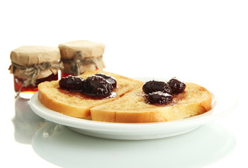 White bread toast with jam on plate, isolated on white