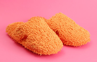 bright slippers, on pink background
