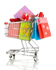 Christmas gifts and shopping in trolley isolated on white