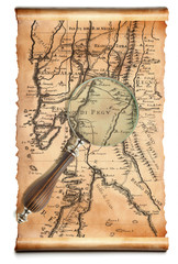 Magnifying glass  and old map