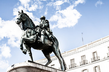 Fototapeta na wymiar The monument of Charles III on Puerta del Sol in Madrid, Spain
