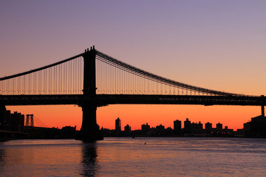 Manhattan bridge Sunrise New York skyline