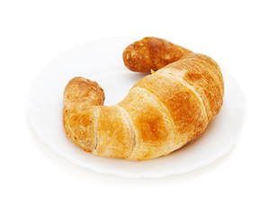 fresh and tasty croissant isolated on white background