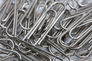 close up paper clip against a white background
