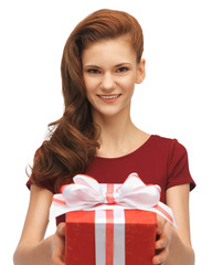 teenage girl in red dress with gift box