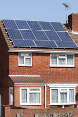 Solar photovoltaic panels on house roof