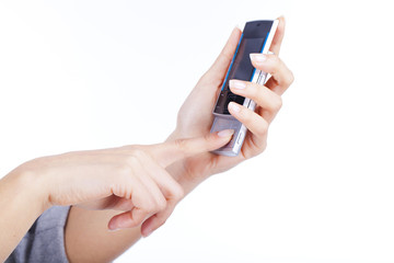 beautiful woman's hands holding a mobile phone