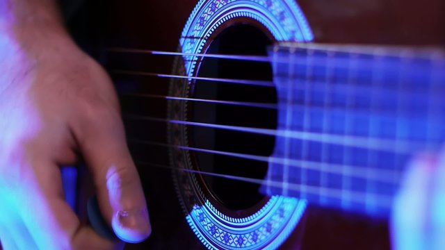 a guitar in the blue light