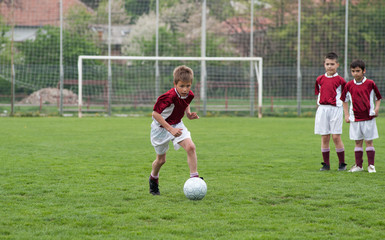 Obraz premium kids soccer game