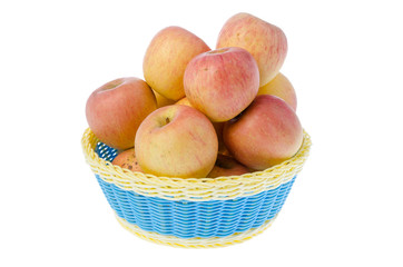 Basket full of apples isolated on white