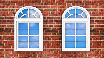 windows on brick wall, with reflection of sky in them