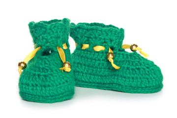 Pair of green knit baby bootees