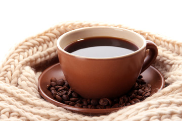 cup of coffee with scarf close-up