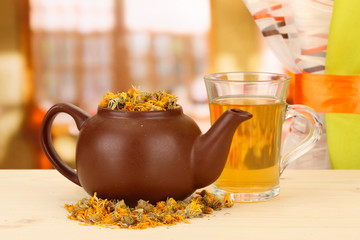 Dried herbs in teapot