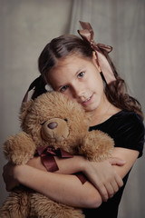 Portrait of beautiful girl with curly hair