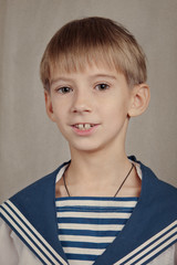 Portrait of boy in sailor suit
