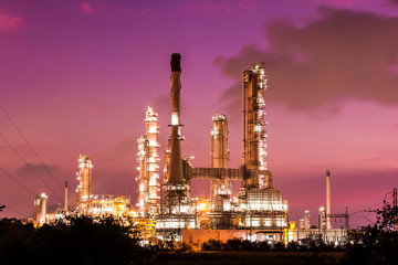 oil refinery plant and smoke at twilight morning
