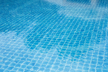 transparent blue pool floor in resort