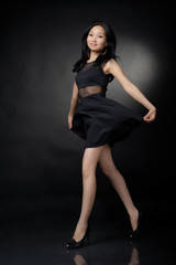 Fototapeta na wymiar Asian woman in black dress