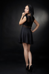 Fototapeta na wymiar Asian woman in black dress