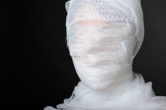 Portrait with bandaged face