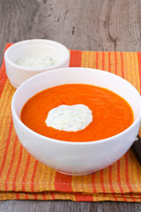 Spicy pepper and tomato soup with cucumber yogurt
