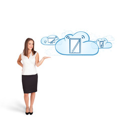 young woman presenting modern devices in clouds
