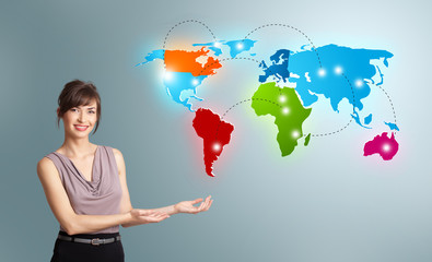 Young woman presenting colorful world map