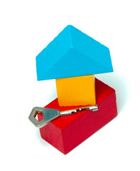 key and a toy block house