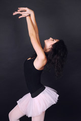 Beautiful dancer athletic girl posing at the camera