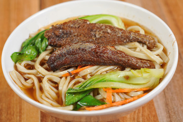 Yellow croaker noodles with vegetables