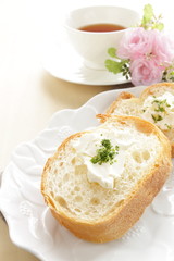 french bread, baguette slided with butter and herb