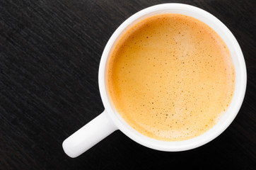 cup of fresh espresso coffee on table