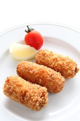 French cuisine, croquette with lemon and tomato