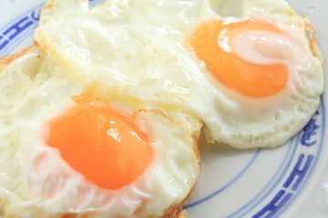 sunny side up on chinese dish
