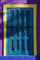 colored venetian blind and wall