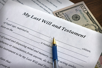 Last Will and Testament form with pen, close-up