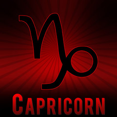 Capricorn symbol with a red background and black burst.