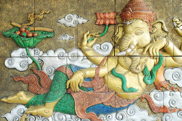 Fototapeta premium ganesh concrete carving on the wall