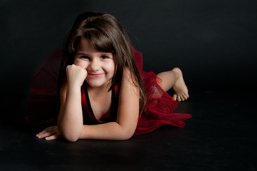 Obraz premium girl with red dress dancing