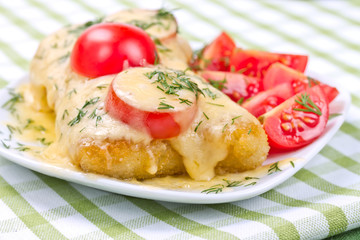 chicken chop under melted cheese