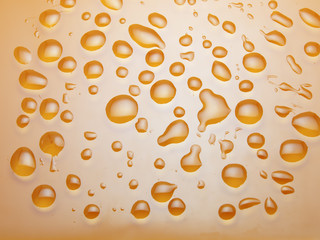 water drops on orange background