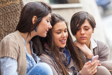 Group of Women Sending Message with Mobile Phone