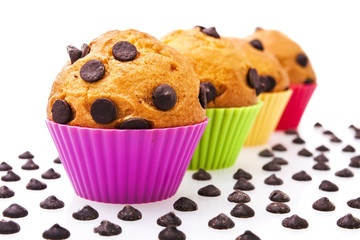 Chocolate chip muffins isolated on white background