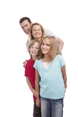 happy family standing in a queu. vertical shoot