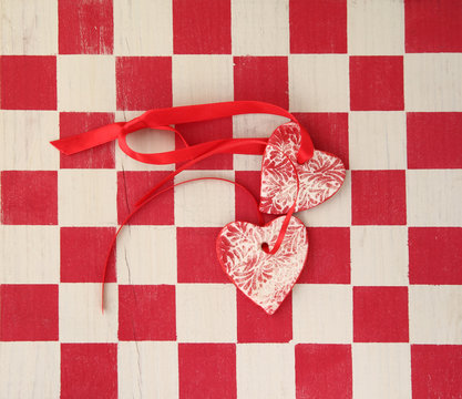 checkerboard with two hearts
