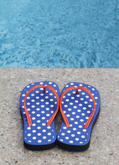 Naklejka premium Flip-Flops By The Pool