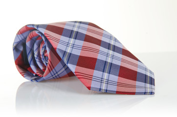 Elegant silk male tie ( necktie ) on white